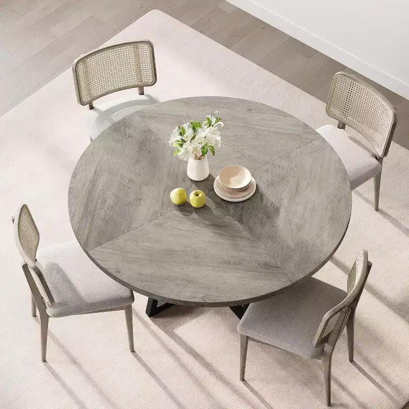 Tavolo da pranzo rotondo grigio, base in metallo incrociata, piano in MDF, 4 posti