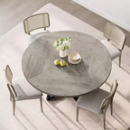 Tavolo da pranzo rotondo grigio, base in metallo incrociata, piano in MDF, 4 posti